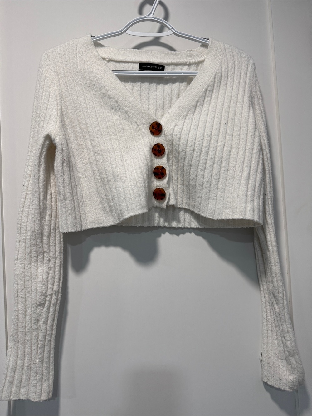 Urban Outfitters Cream Cropped Ribbed V-Neck Cardigan with Tortoiseshell Buttons